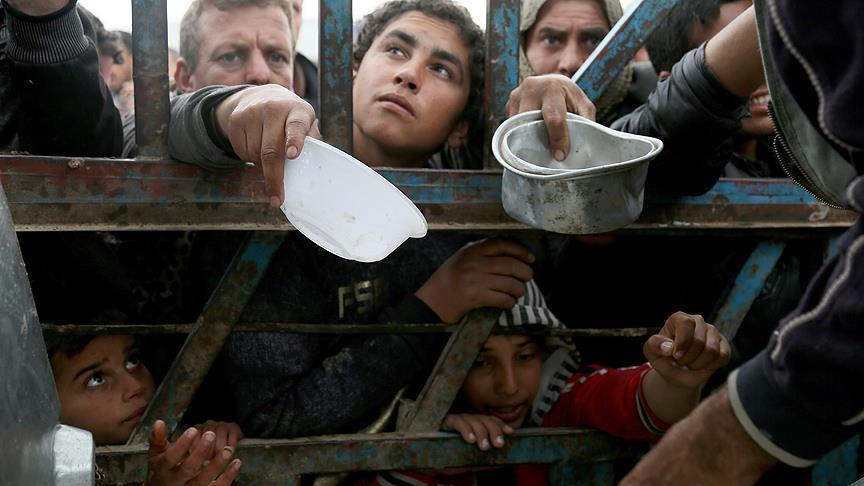 منظمة دولية: نقص حاد في الأغذية في مناطق "داعش" غربي الموصل