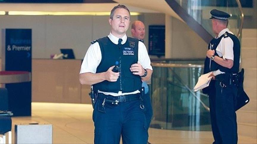 Woman shot, 6 arrested in UK terror raids