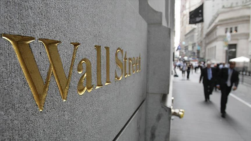 Wall Street closes flat