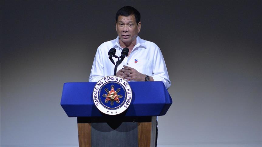 Philippines president urges rebels to shun violence