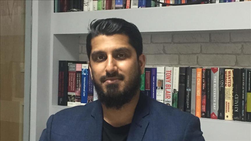 UK: NGO director charged for refusing to give passwords