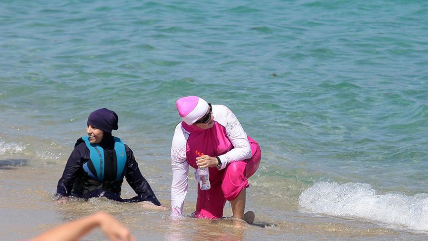 Women in burkinis stopped from swimming in Cannes