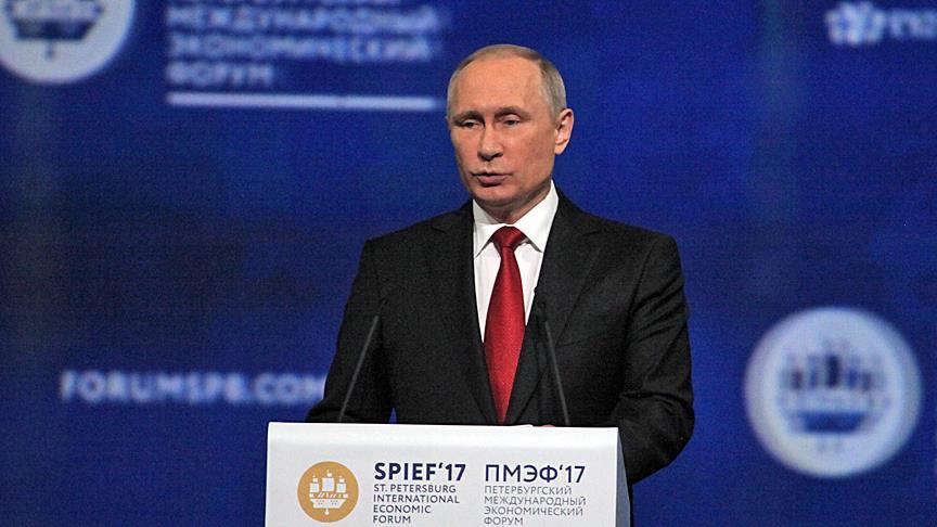 Putin calls on US businessmen to help 'normalize' ties