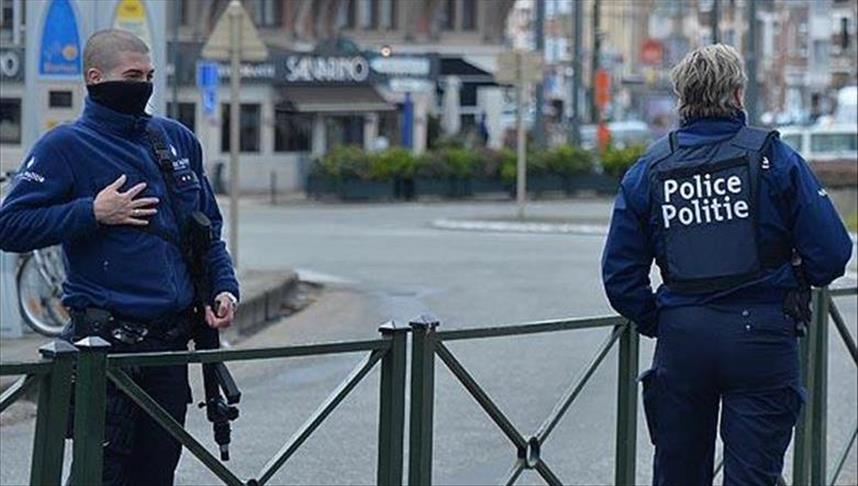Belgian police arrest 12 over Brussels terror attacks