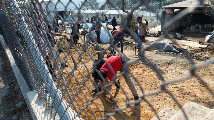 Refugees, migrants clash with police on Greek island
