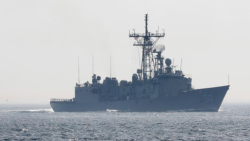 US ship fires warning shot at Iranian boat