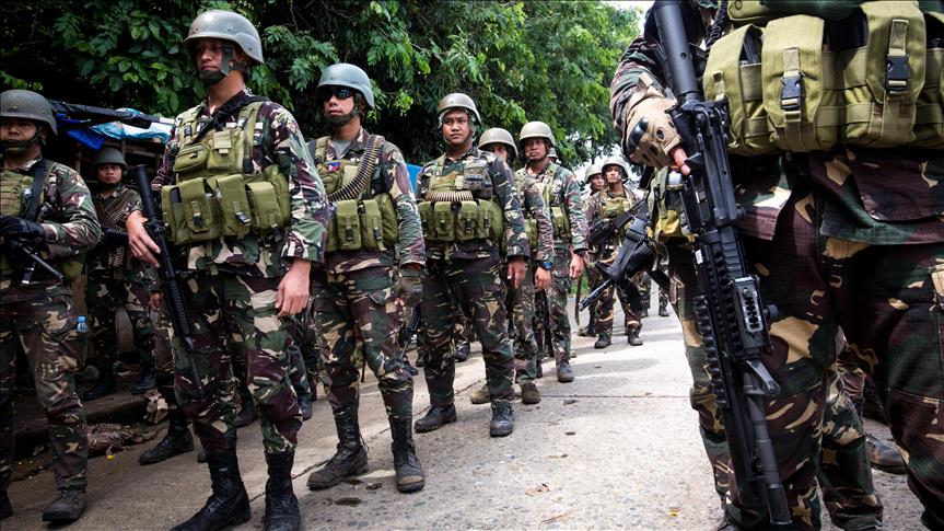 Philippine army hands out checks to fallen troops' kin