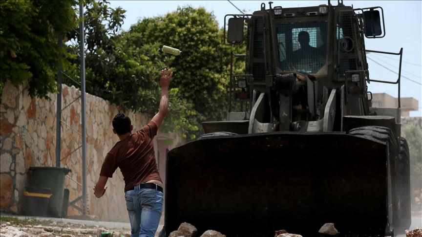Israel razes part of Islamic cemetery in E. Jerusalem