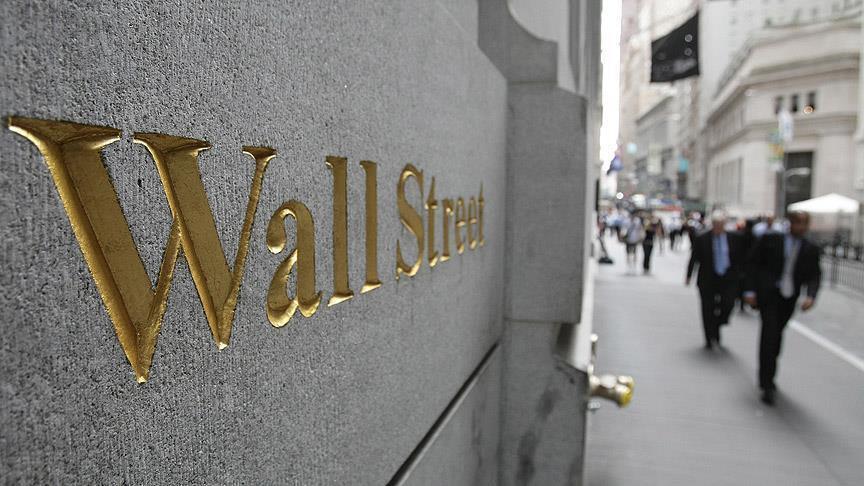 Communication stocks push Wall Street to record close