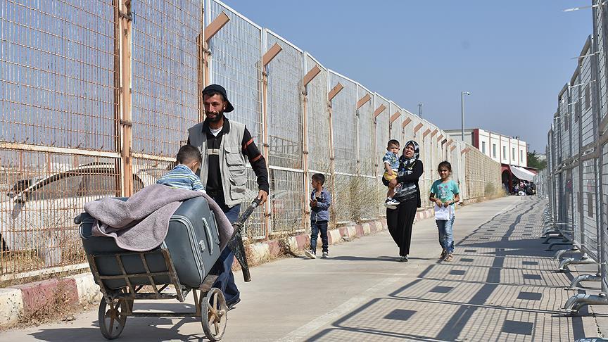 Syria-Turkey crossing ceded to leading opposition group