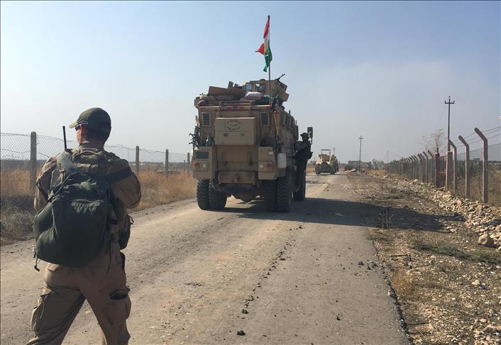Peshmerga hand over security in disputed parts of Iraq