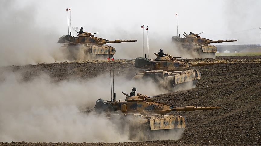 Turkish, Iraqi forces reach border crossing on Iraqi side