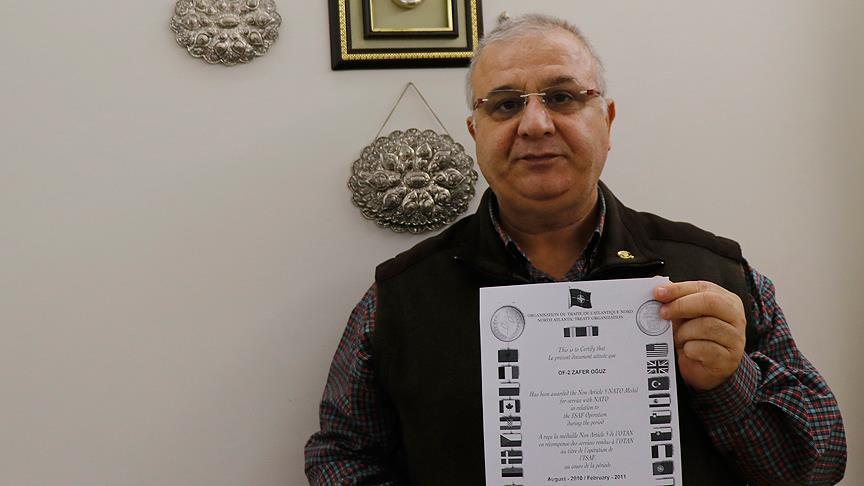 Retired Turkish army major returns his medal to NATO