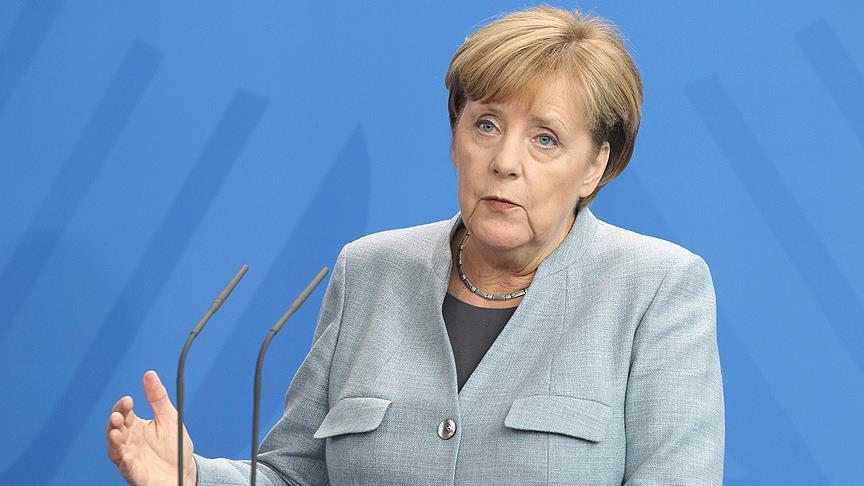 Merkel begins coalition talks with Social Democrats