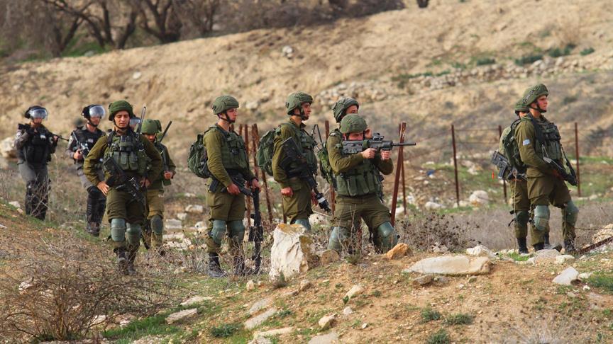 Israeli army detains 14 Palestinians in West Bank raids