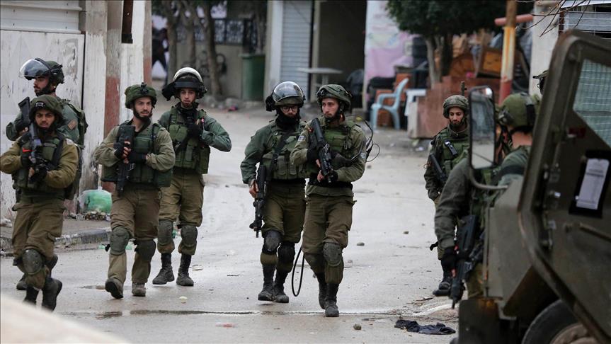 Israel detains 19 Palestinians in dawn raids in W. Bank