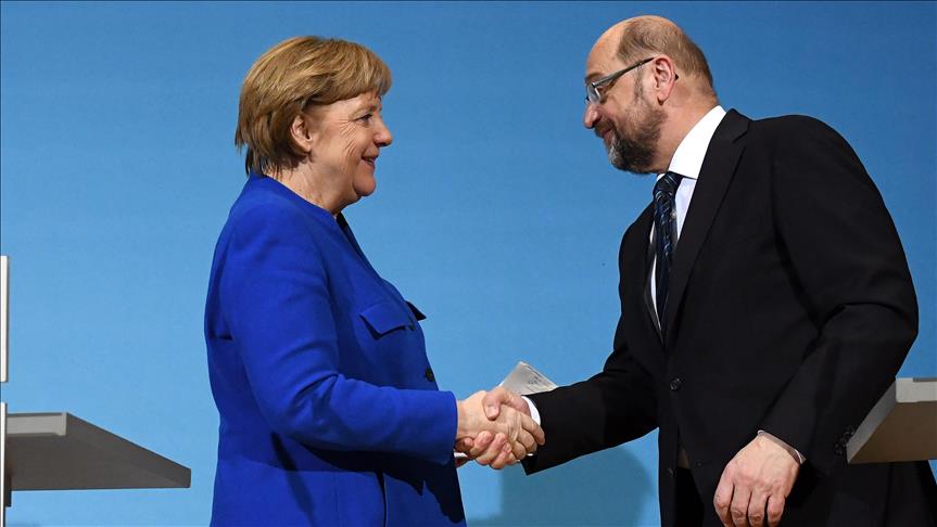 SPD congress backs coalition talks with Merkel