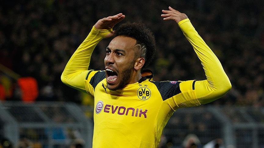 Football: Arsenal sign Aubameyang for record fee