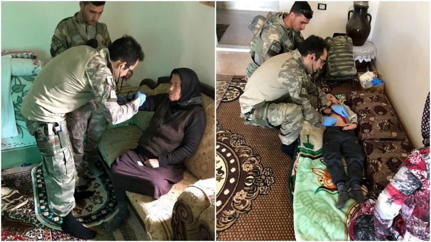 Turkish troops give health checks to Afrin civilians
