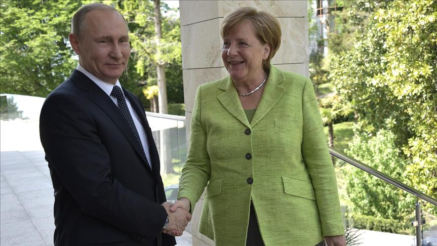 Russia's Putin, Germany's Merkel discuss Iran deal