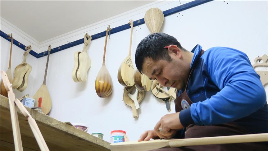 Hands of Kazakh craftsman pass down musical culture