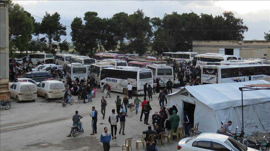 Evacuations continue from Syria's Homs to Aleppo, Idlib