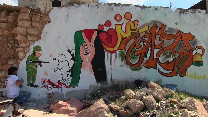 Syrie: Graffitis en soutien à Gaza sur les décombres d'Idleb