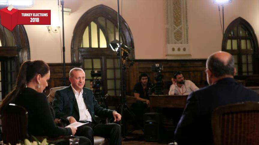 Erdogan hints at lifting state of emergency after polls