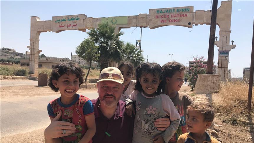 Innovative Syrian father brings Eid joy to his children