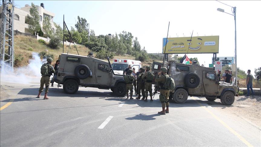 Israeli army detains 13 Palestinians in West Bank raids