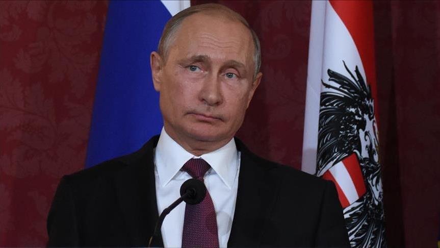 Putin pledges 'to act proportionally' to NATO expansion