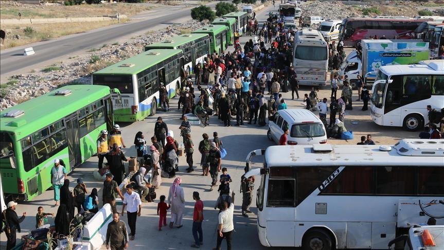 1st evacuation convoy from Quneitra arrives in Idlib