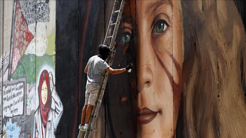 Israel expels Italian artists over al-Tamimi mural