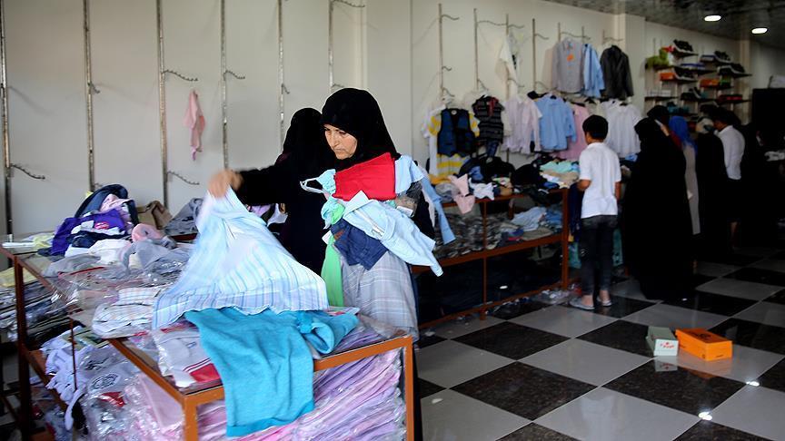 Turkish aid agency provides clothes to Syrian orphans