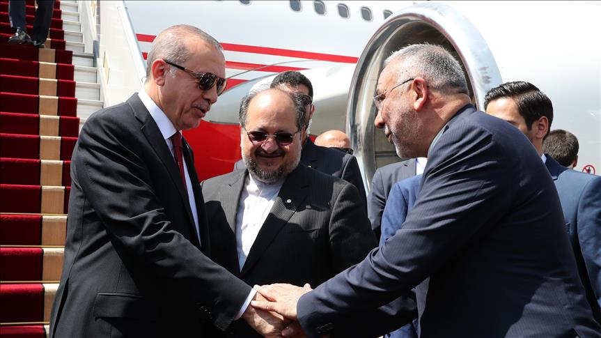 Turkish president arrives in Iran for trilateral summit