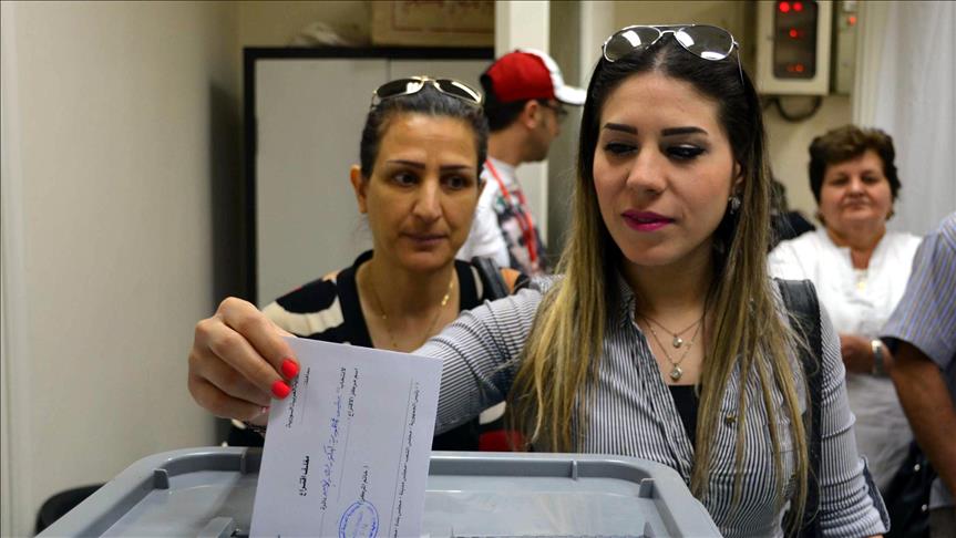Syrian regime holds local polls despite refugee crisis