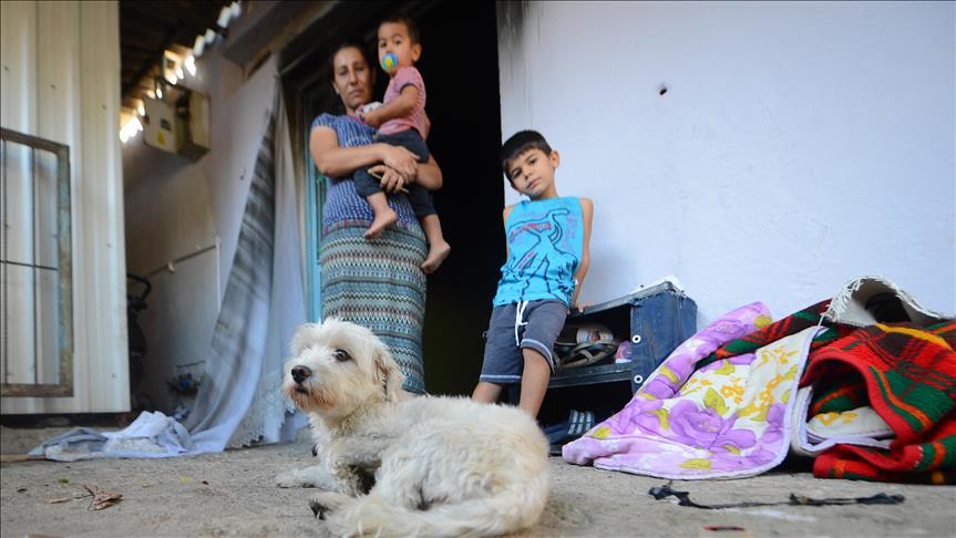Yangın çıkan evdeki aileyi 'Cesur' köpek kurtardı