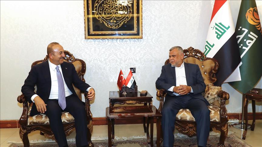 جاويش أوغلو يلتقي رئيس منظمة بدر العراقية في بغداد