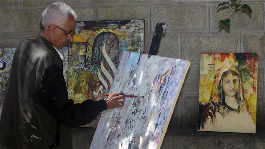 Mülteci ressam tablolarına Yemen halkının acılarını işliyor