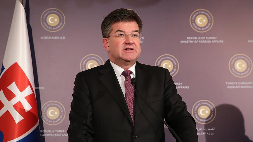 Slovak FM quits after parliament rejects migration pact