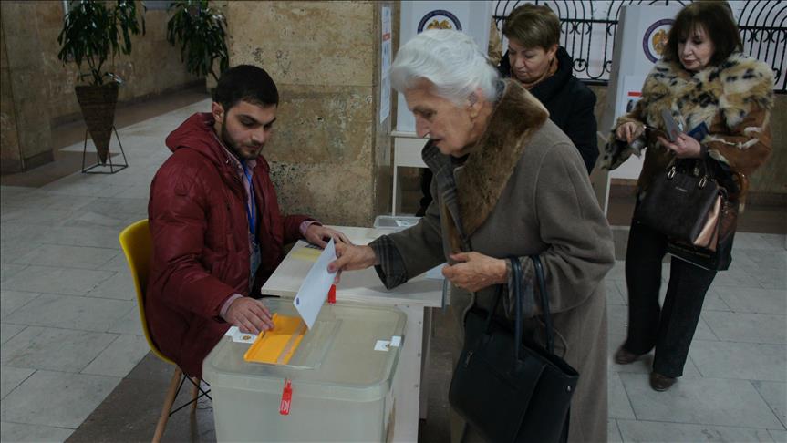 Armenians voting in early parliamentary elections