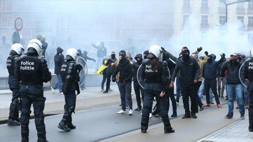 Belgian police use teargas on anti-migration protesters