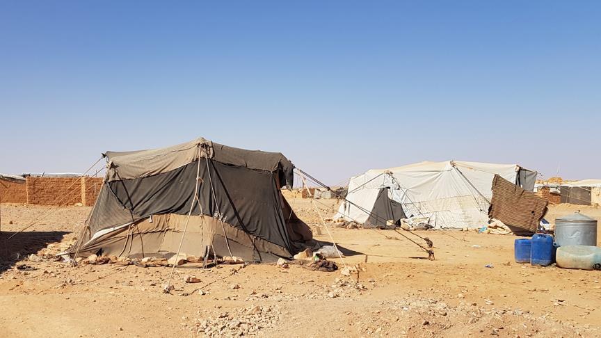 Syrians stranded near Jordan border await aid corridor