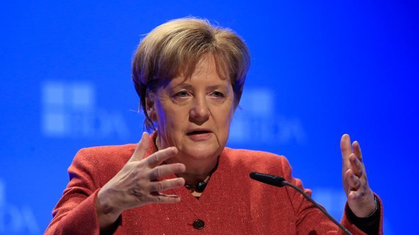 Germany’s Merkel backs revised Brexit deal