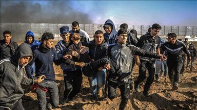 Israel opens fire on Gaza rally, killing 2 Palestinians