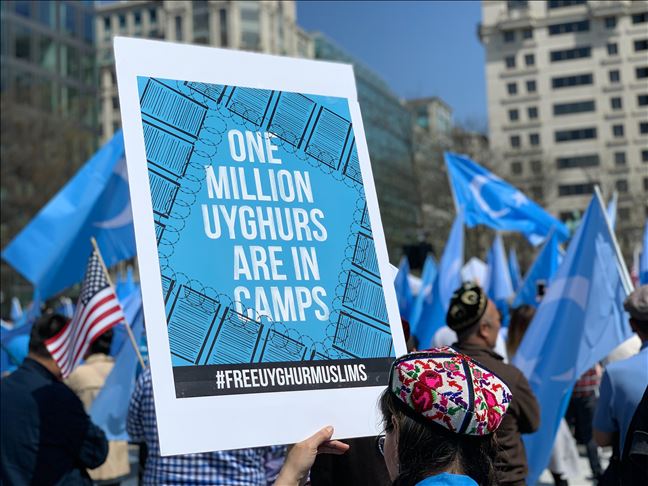 Hundreds protest China, urge US action for Uighurs