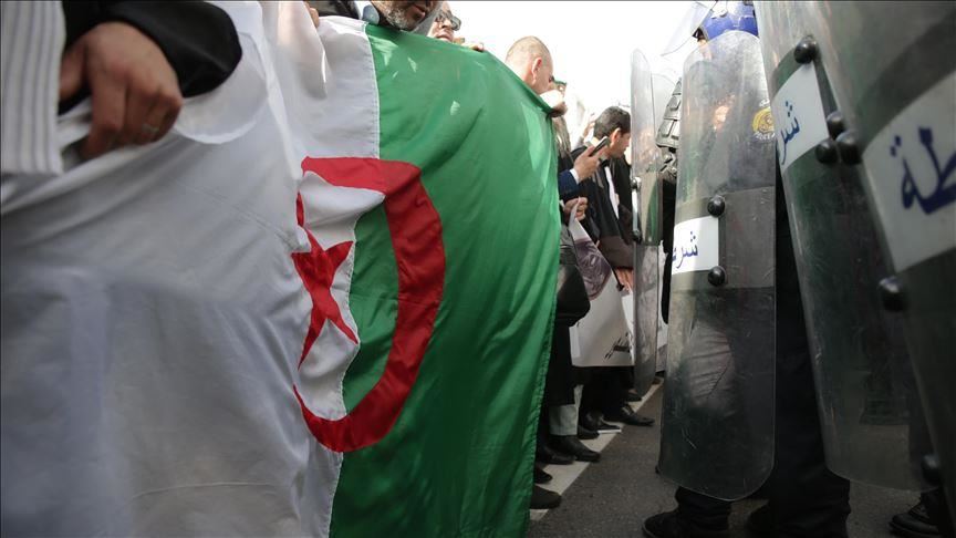 Algerians protest new interim president