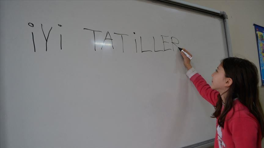 Summer beckons as Turkish students wave school goodbye