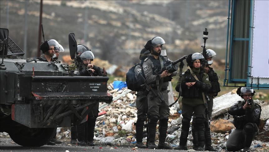 Israel detains 11 Palestinians in overnight raids