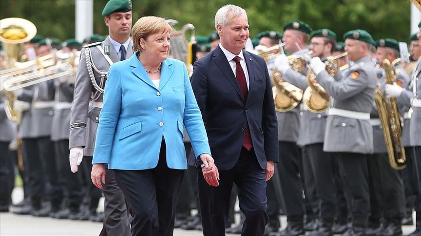 Merkel seen shaking again at public ceremony